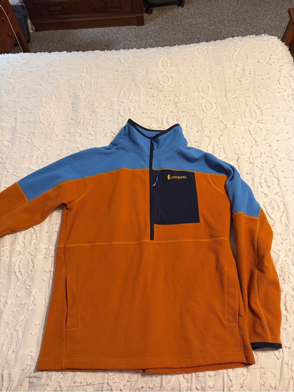 cotopaxi Orange and Light Blue Half-Zip Fleece Pullover with Navy Chest Pocket